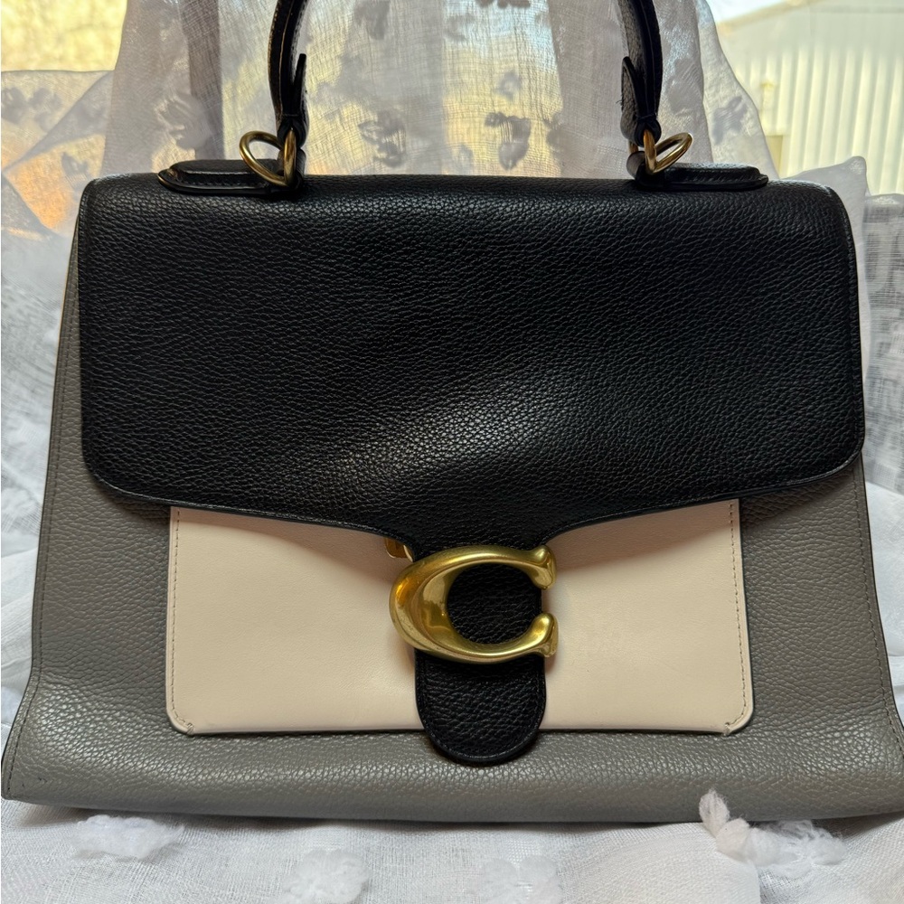 Elegant Black and Cream Satchel with Gold Accent